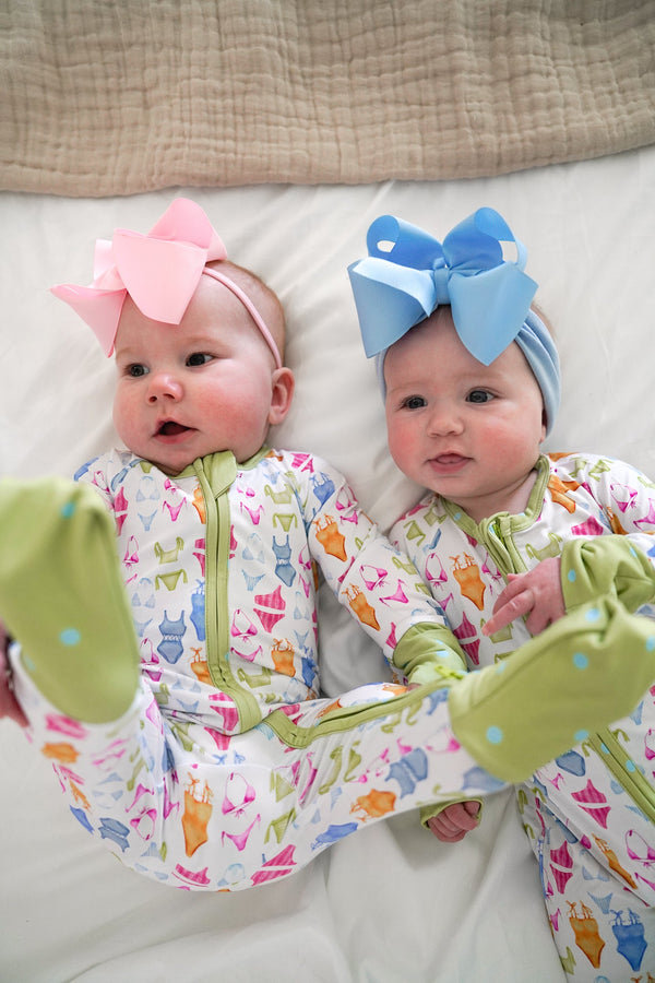 Bamboo Sleeper Bikinis for babies, cozy pajamas in soft fabric, angle view showcasing design and comfort.