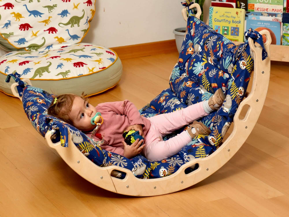 Medium Montessori climbing arch rocker set with pillow and ramp for babies, promoting active play and motor skills development.
