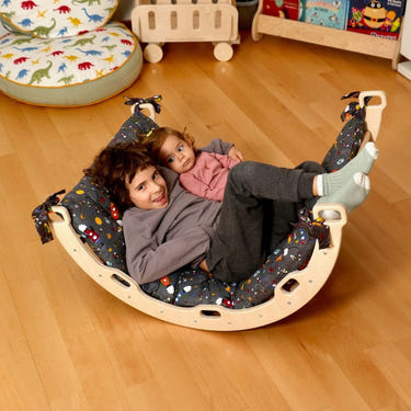 Medium Montessori climbing arch rocker set with pillow and ramp for babies, promoting active play and motor skills development.