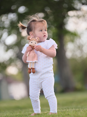 Organic cotton baby leggings with star pattern, perfect for comfort and style.