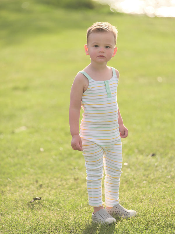 Organic cotton striped overall for babies, showcasing a stylish design from angle 2. Perfect for comfort and cuteness!