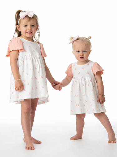 Organic cotton Alice ruffled dress for babies, featuring a charming butterfly design. Perfect for toddlers.