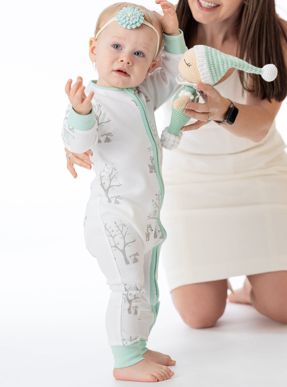 Organic cotton woodland romper for babies, soft and eco-friendly jumpsuit, perfect for playtime and comfort.