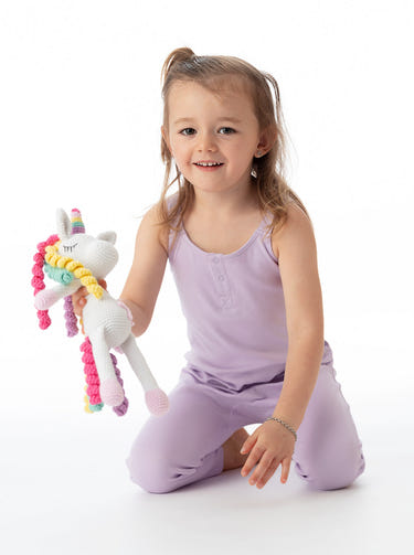 Organic cotton lavender overall for babies, soft and eco-friendly, perfect for comfortable playtime.