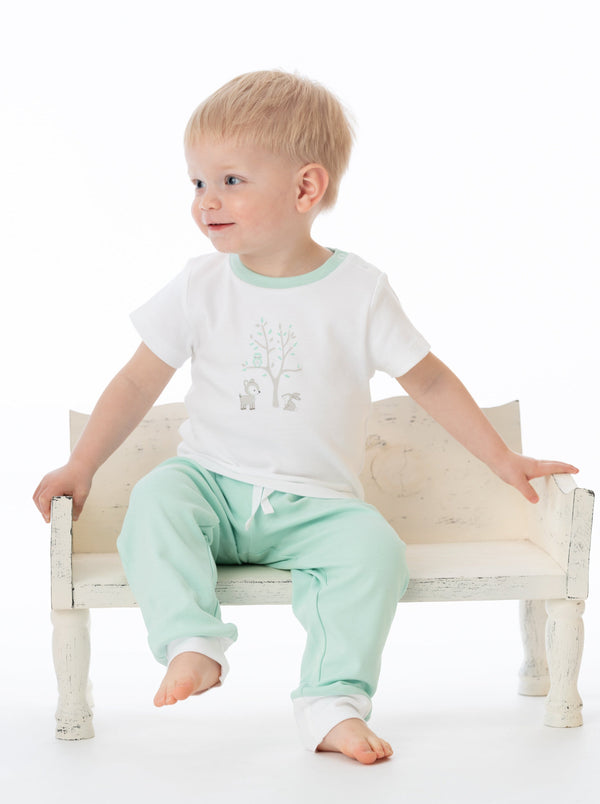 Mint green organic cotton jogger pants for babies, angle view showcasing soft fabric and comfortable fit.