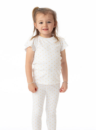 Organic Cotton Ashley Ruffled Tee in Star print for babies, featuring soft fabric and stylish design.