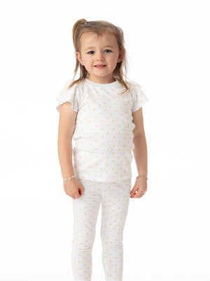 Organic cotton leggings for babies featuring a star pattern, shown from angle 3. Perfect for comfort and style.