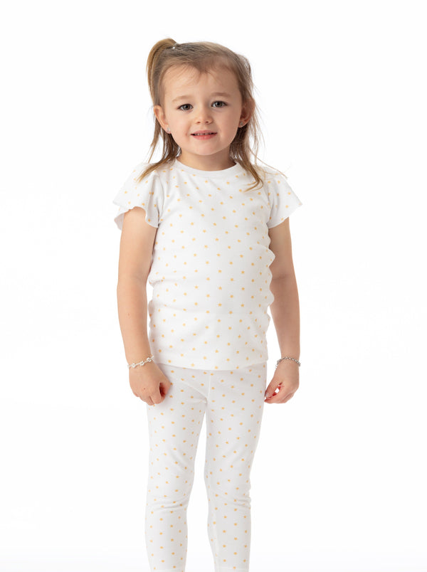 Organic cotton leggings for babies featuring a star pattern, shown from angle 3. Perfect for comfort and style.