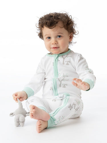 Organic cotton woodland romper for babies, soft and eco-friendly jumpsuit, perfect for playtime and comfort.