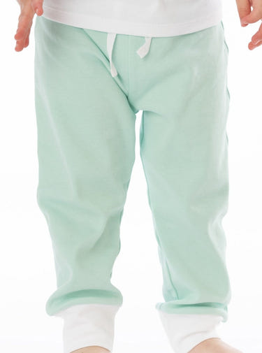 Organic cotton jogger pants in mint green for babies, soft and stylish for comfortable playtime.