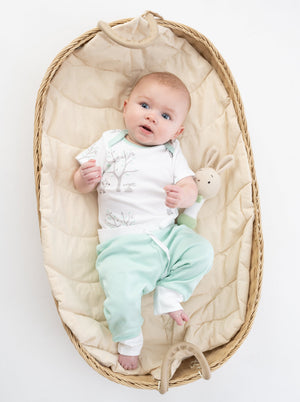Mint green organic cotton jogger pants for babies, angle view 4, soft and comfortable for everyday wear.