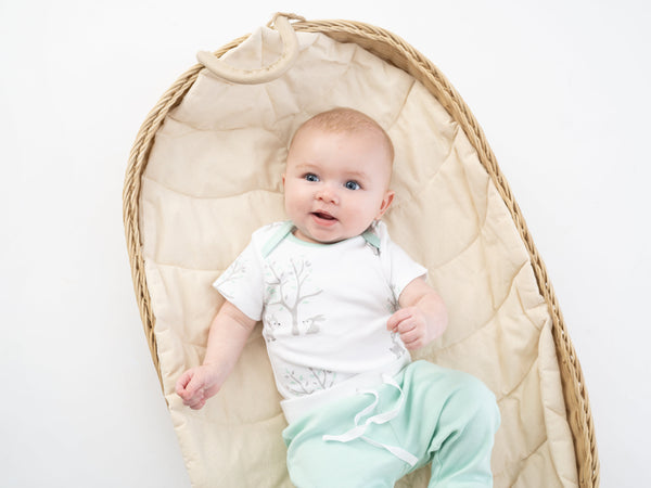 Mint green organic cotton jogger pants for babies, angle 6 view showcasing soft, comfortable design.