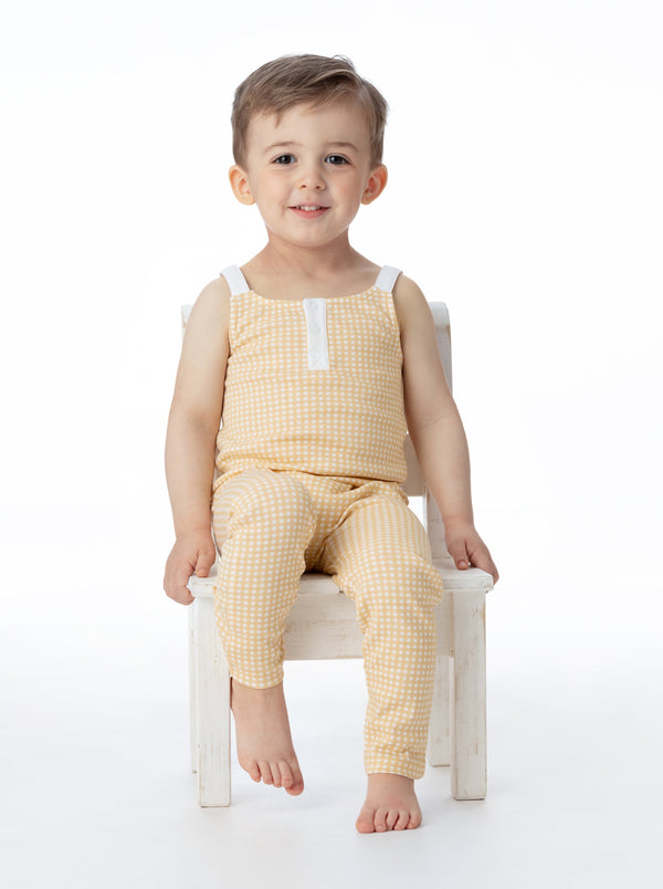 Organic cotton overall in butter gingham pattern for babies, soft and stylish for everyday wear.