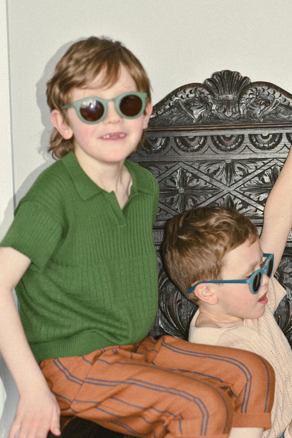 Classic sustainable sunglasses for kids aged 3-8, plant-based, bendable, polarized, shown at angle 18.