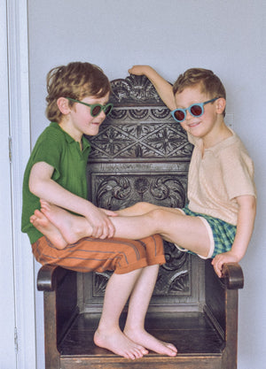 Classic sustainable sunglasses for kids aged 3-8, plant-based, bendable, polarized, shown at angle 9.