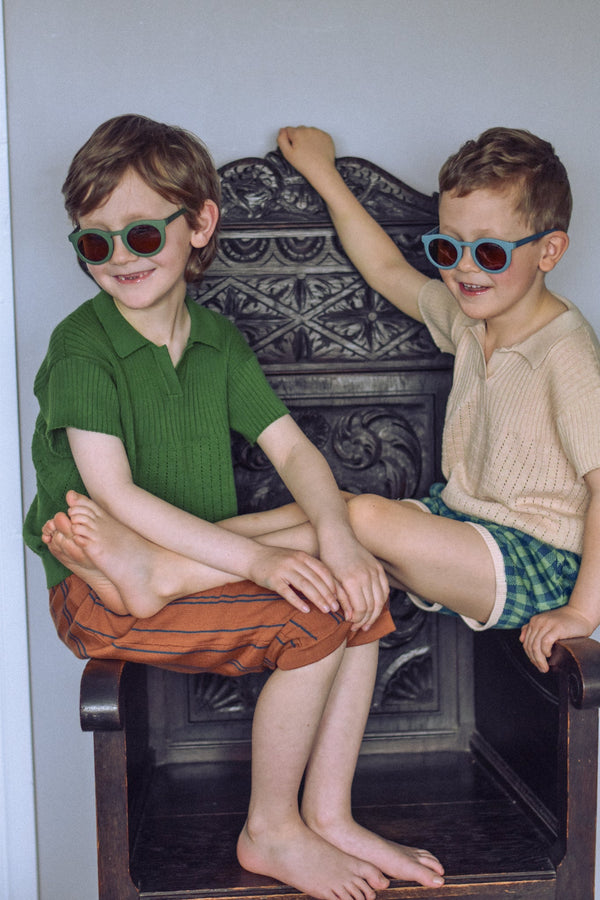 Classic sustainable sunglasses for kids aged 3-8, plant-based, bendable, and polarized, shown at angle 17.