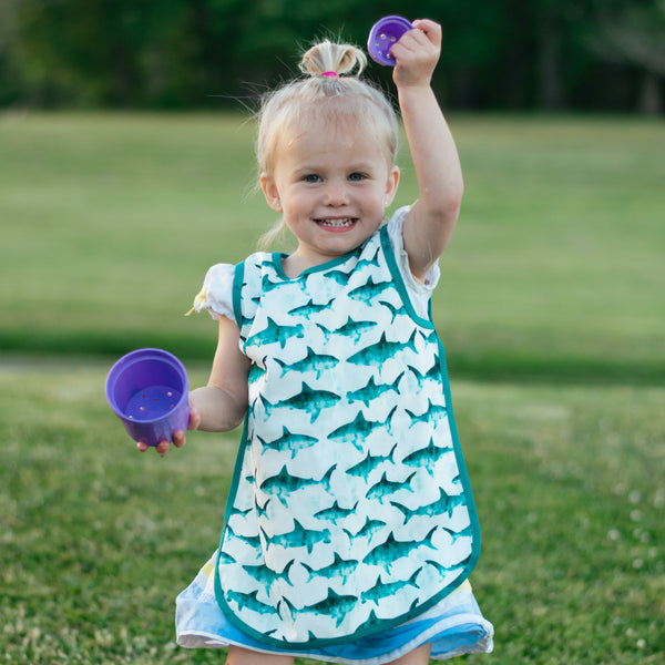 Shark Attack Bapron for babies, playful design, angle view, perfect for mealtime messes.