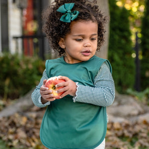 Solid Pine Minimalist Bapron for babies, showcasing a stylish and functional design from angle 7.