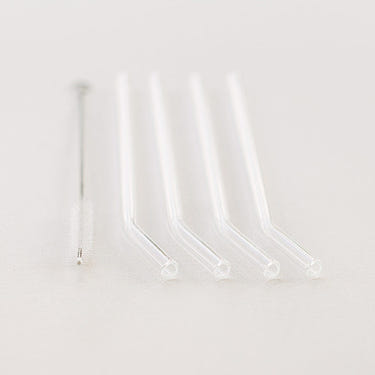 "Set of 4 glass straws for babies, perfect for eco-friendly feeding and safe sipping."