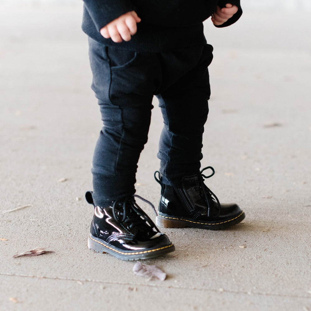 Jet Black combat boots for babies, stylish and durable footwear for little adventurers.
