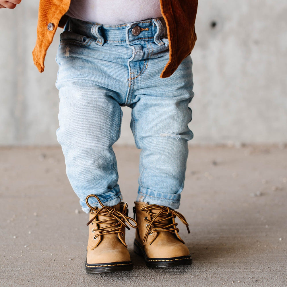 Natural baby combat boot in stylish design, perfect for little explorers.