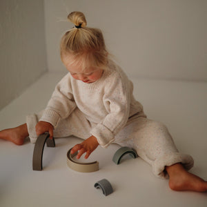 Colorful Rainbow Stacker Toy for babies, showcasing vibrant rings in Angle 11 view, perfect for developmental play.