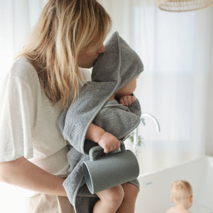 Colorful baby bath rinse cup at angle 12, perfect for gentle rinsing during bath time.