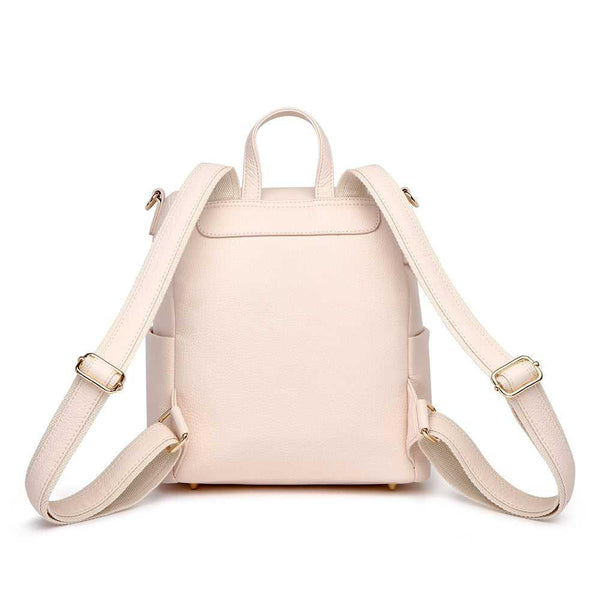 Pastel pink Petit Diaper Bag at angle 6, stylish and functional for modern parents.