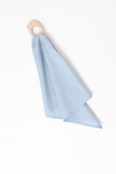 Dove Linen + Maple Ring Teether for babies, soft and safe for soothing gums during teething.