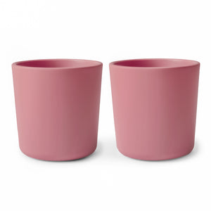 Colorful baby dinnerware cups in various sizes, perfect for mealtime fun and learning.