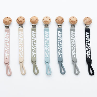 Nash Everything Clip in Leopard design - stylish and functional pacifier clip for babies.