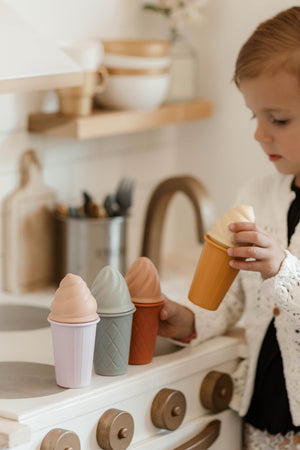 Colorful silicone ice cream cones for babies, perfect bath toys for fun and imaginative playtime in the tub.