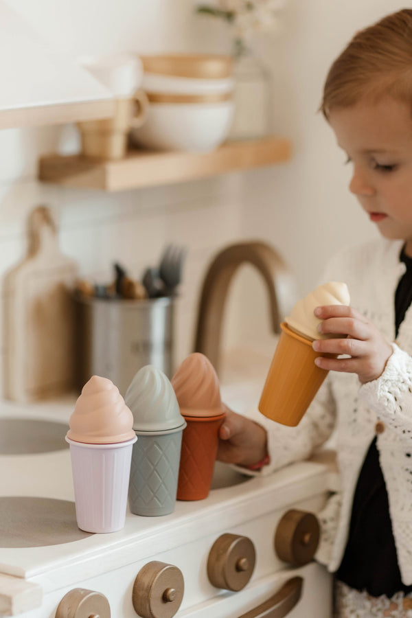 Colorful silicone ice cream cones for babies, perfect bath toys for fun and imaginative playtime in the tub.