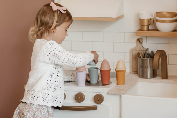 Colorful silicone ice cream cones for babies, perfect bath toys for fun and imaginative playtime.