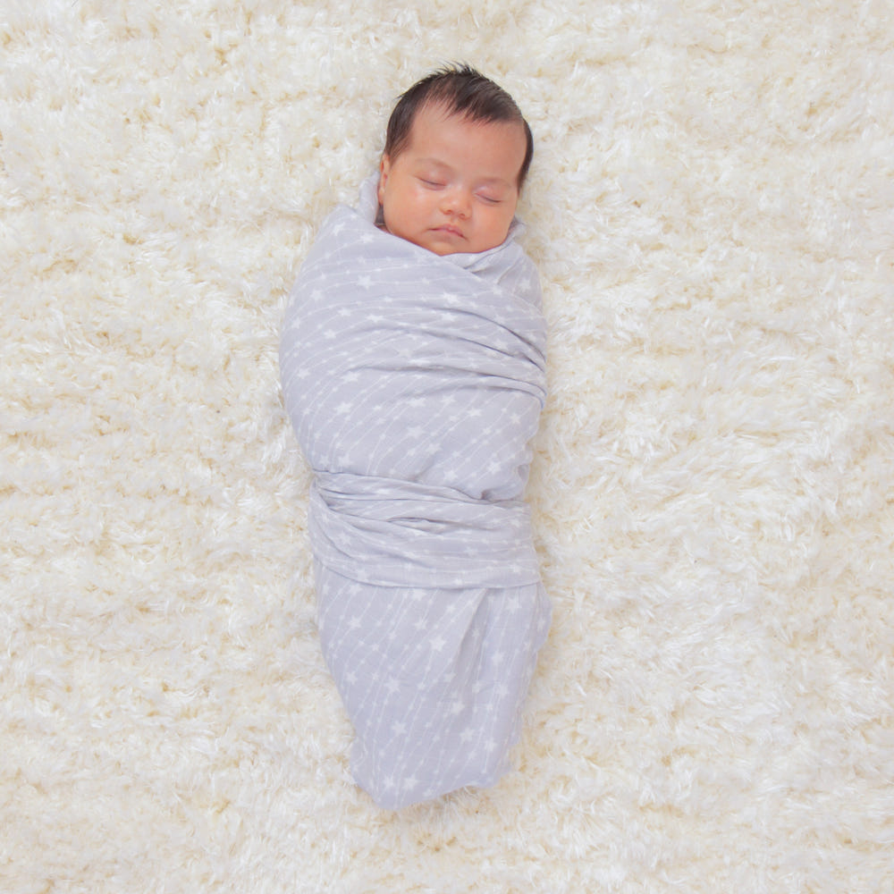 Grey muslin swaddle blankets, 4 pack, soft and breathable for comfortable baby sleep.