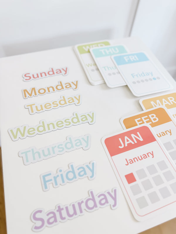 Colorful calendar flashcards and magnets for early learning, featuring days, months, and seasons for sensory play.