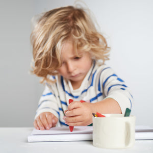 Triangle non-toxic beeswax crayons in vibrant colors, perfect for safe and creative play for babies and toddlers.