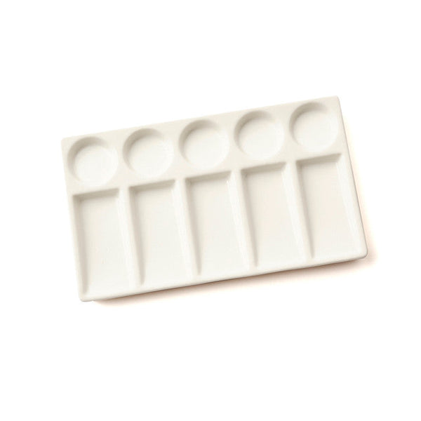 Porcelain palette for baby art, durable and easy to clean, shown from angle 2. Perfect for little artists!