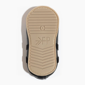 Ebony ballet slipper baby shoe, angle view, perfect for tiny dancers and stylish infants.