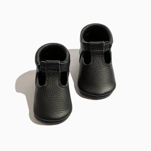 Ebony T-Bar Baby Shoe - stylish and comfortable footwear for infants, perfect for any occasion.