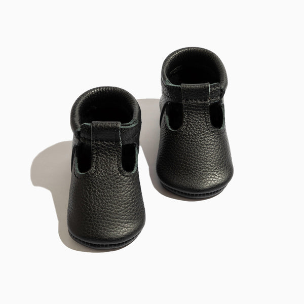 Ebony T-Bar Baby Shoe - stylish and comfortable footwear for infants, perfect for any occasion.