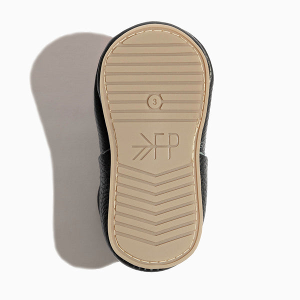 Ebony T-Bar Baby Shoe from angle 5, stylish and comfortable for little feet.
