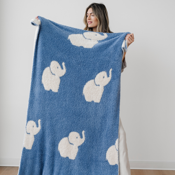 Double-layer Bamboni® toddler blankets in a cozy angle, perfect for swaddling and keeping your baby warm.