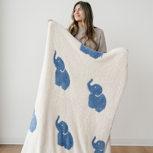 Cozy DOUBLE-LAYER BAMBONI® toddler blankets in soft fabric, perfect for swaddling and keeping little ones warm.