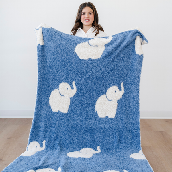 Double-layer Bamboni® toddler blankets in a cozy angle, perfect for swaddling and keeping your baby warm.