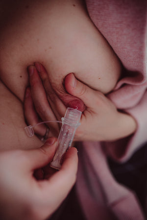 Haakaa Silicone Colostrum Collectors 4 ml, 2 PK - Pre-Sterilized breastfeeding accessories at angle 6.
