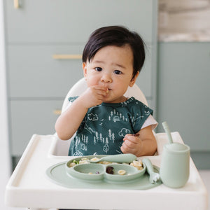 Pine Forest Bapron for babies, showcasing a stylish design from angle 2, perfect for mealtime messes.