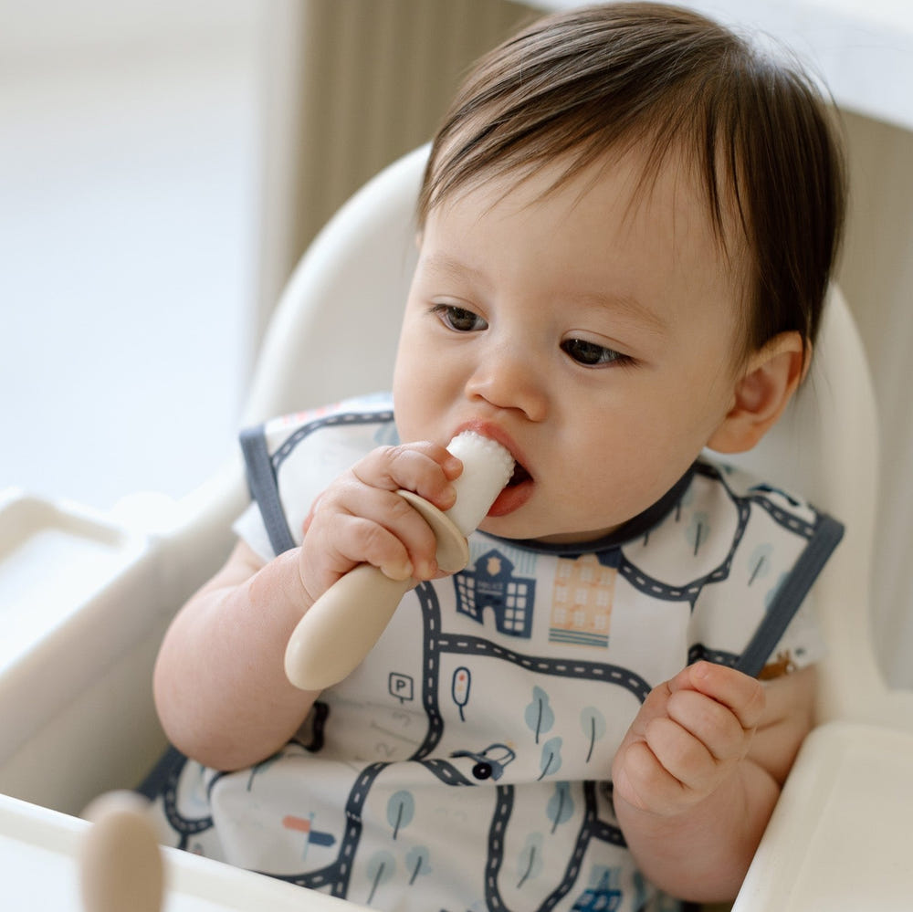 Tiny Town Bapron for babies, stylish and practical, perfect for mealtime messes and playtime fun.