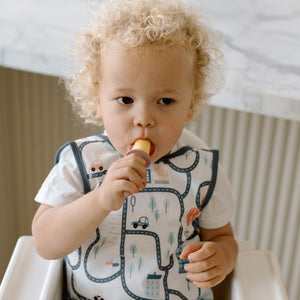 Tiny Town Bapron for babies, stylish and functional, shown at angle 8 for a clear view of design and features.