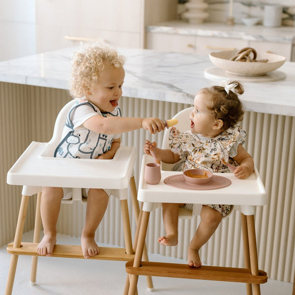 Tiny Town Bapron in Angle 12, colorful and functional baby apron for mess-free feeding and playtime.